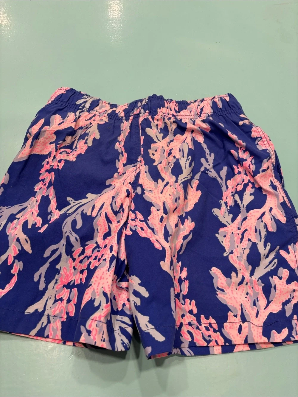 Lilly Pulitzer Blue Swim Trunks with Pink Coral Motif